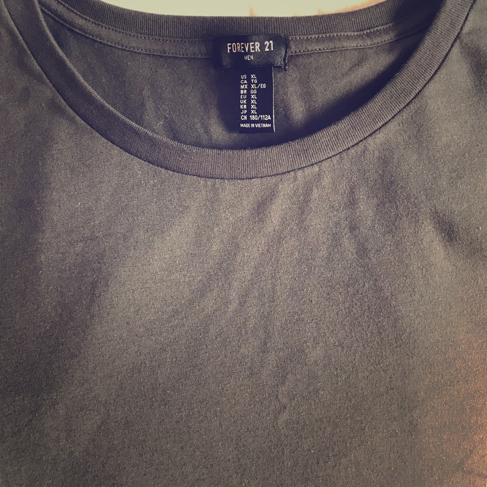 Short sleeved scallop tee shirt.